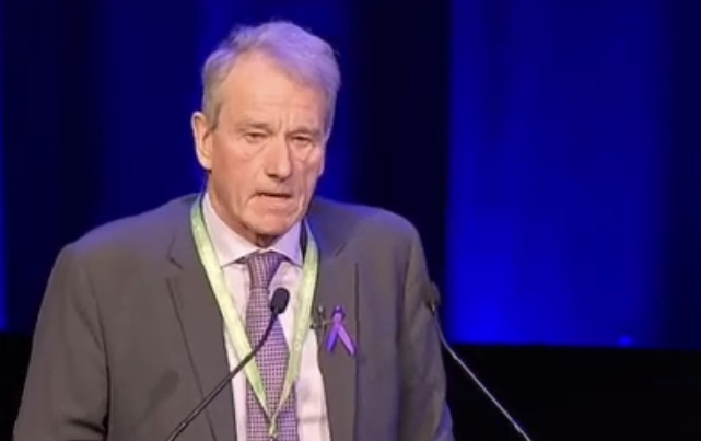 Peter Reading presenting at a conference